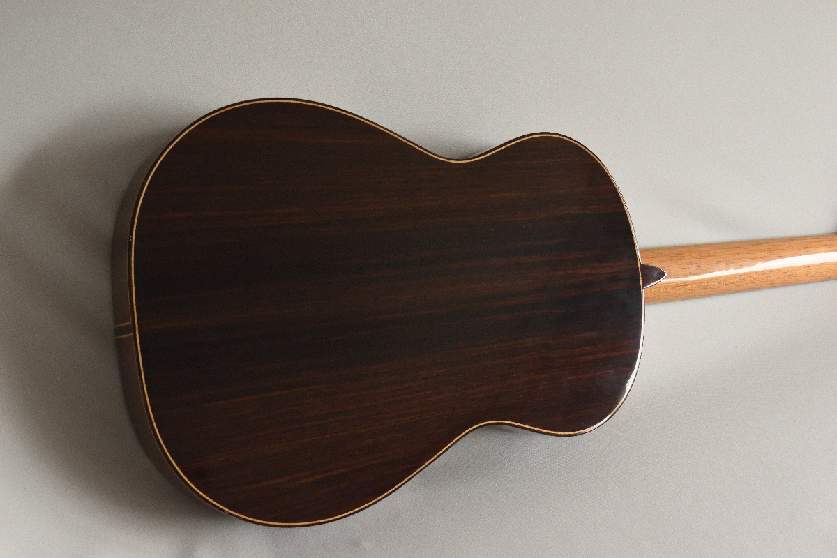 Back and sides are Indian Rosewood 